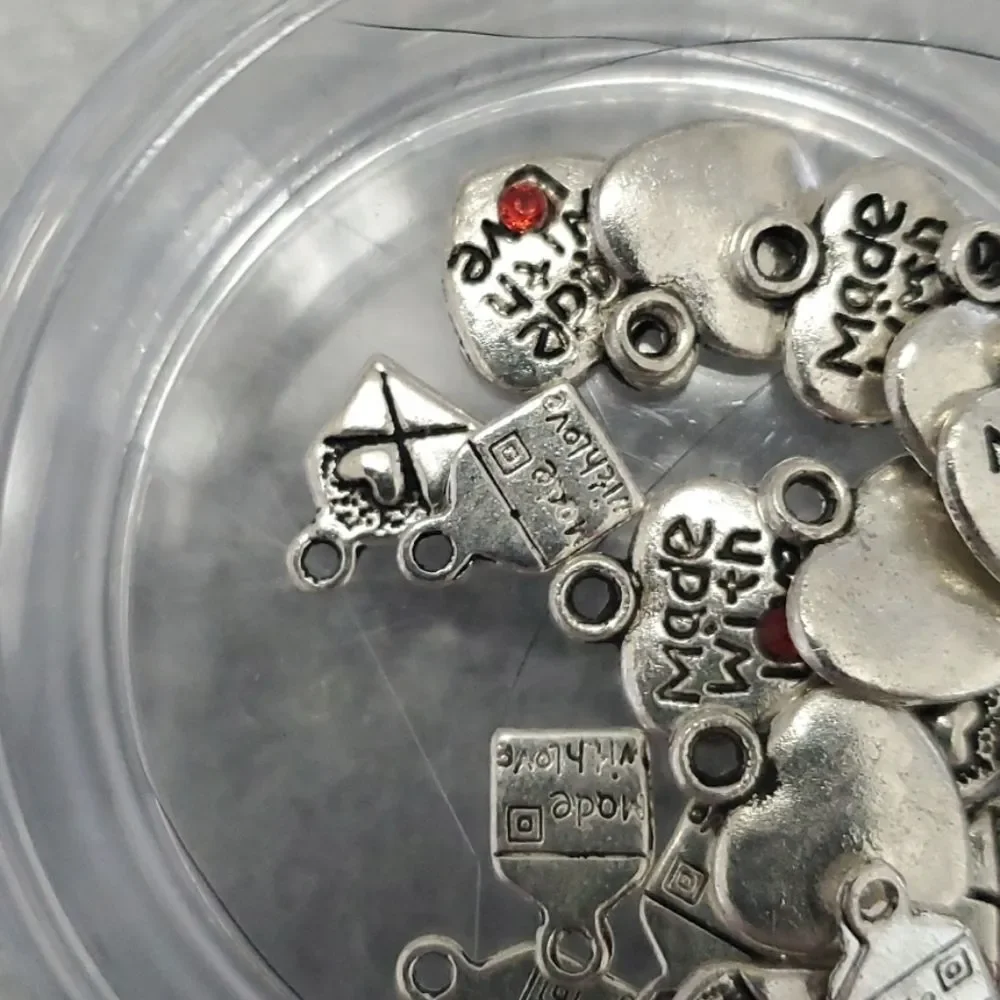 Beads and charms and beads and charms lot